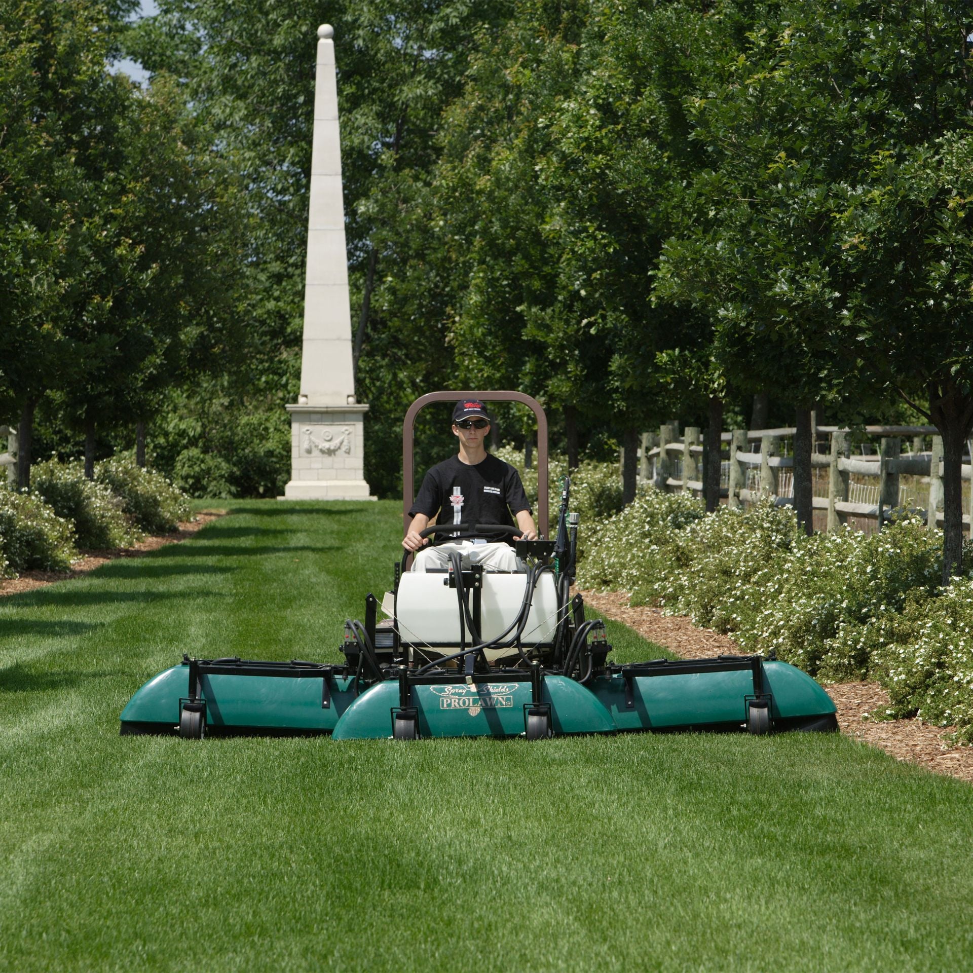 Grasshopper Shielded Sprayer (533436) — manufacturer marketing image (grasshoppermower.com/attachments/frontmount-shielded-sprayer)