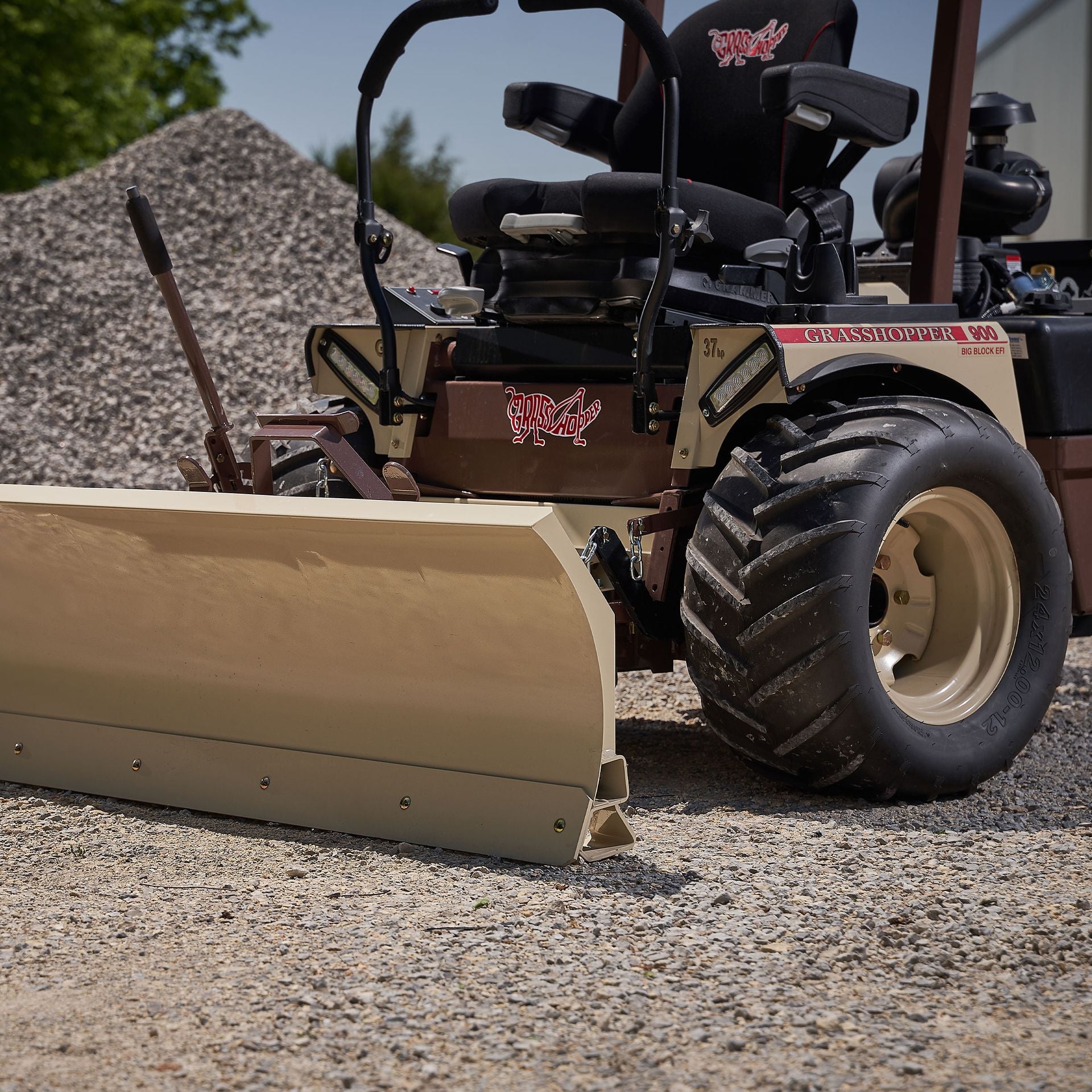 Grasshopper Dozer Blade (533478) — manufacturer marketing image (grasshoppermower.com/attachments/frontmount-dozer-blades)